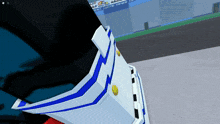 a white vehicle with blue stripes and yellow lights on the side