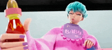 a cartoon character with blue hair is wearing a pink baby bib and holding a bottle .