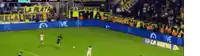 a blurry picture of a soccer field with a banner that says " la nueva "