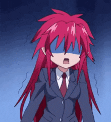 a girl with red hair is wearing a suit and tie covering her eyes
