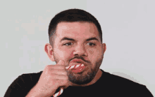 Tasting Candy Cane GIF - Tasting Candy Cane Licking GIFs