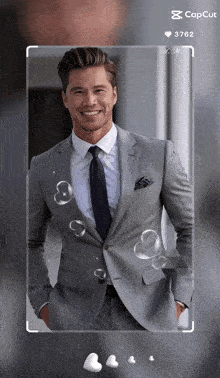 a picture of a man in a suit and tie with the number 3762 on the bottom right