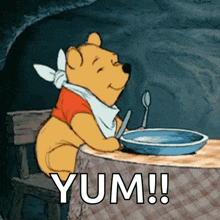 a cartoon of winnie the pooh sitting at a table with a plate of food and the words yum written below him