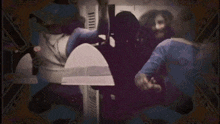 a group of people are standing next to each other in a dark room