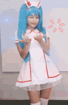 a girl with blue hair and a nurse costume