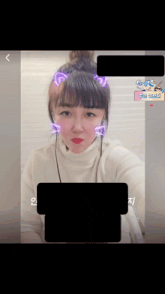 a picture of a woman with purple ears and a bun