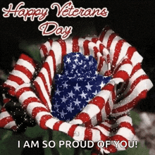 a happy veterans day greeting card with a flower decorated with the american flag .