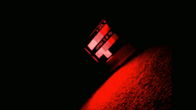 a red light is coming out of a box that says approved to & ice
