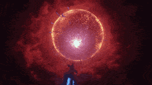 a person is standing in front of a huge sphere of light