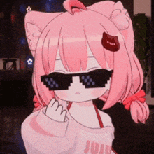 a cartoon girl wearing sunglasses and a sweater that says juice