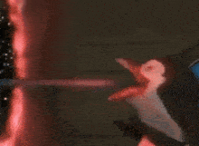 a penguin is holding a toothbrush in front of a toothpaste dispenser