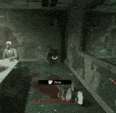 a man in a tuxedo is sitting at a table in a dark room while a monster is standing next to him .