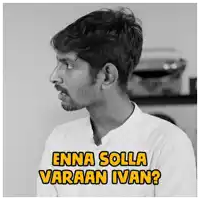 a man with the words enna solla varaan ivan on his shirt
