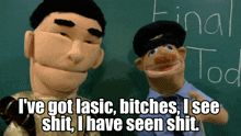 a puppet says i 've got lasic bitches i see shit in front of a blackboard