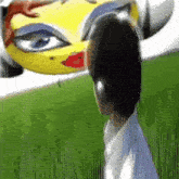 a man wearing headphones stands in front of a cartoon character 's face