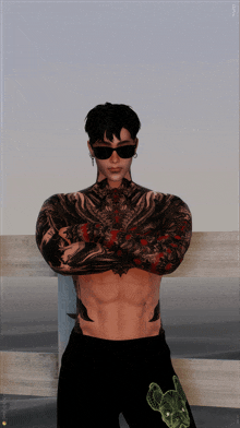 a man with a lot of tattoos on his arms and chest