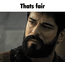 a man with a beard and the words that 's fair