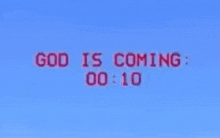 a computer screen displays the words god is coming in red letters
