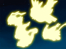 a group of glowing birds are flying in the sky