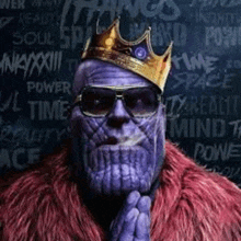 thanos from avengers infinity war is wearing a crown and sunglasses .