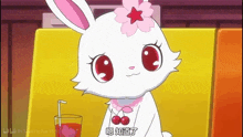 a white rabbit with a pink flower on its head is sitting on a yellow chair with a drink in a glass .