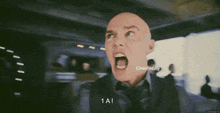 a man in a suit and tie is screaming with the words cinemacity below him