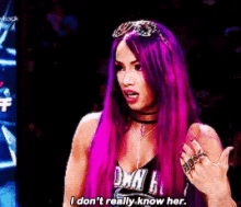 a woman with purple hair says i don 't really know her .