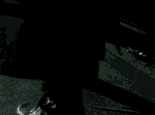 a man with white hair is smoking a cigarette at night