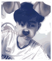 a boy wearing a shirt that says real madrid