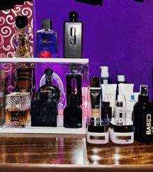 several bottles of perfume including a bottle of established 9