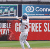 a baseball player with the number 24 on his shirt