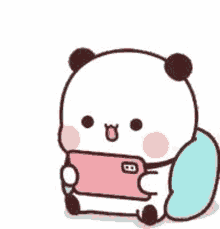 a panda bear is sitting down holding a pink phone .