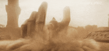a blurred image of a person 's hand with the numbers 0902 on the bottom