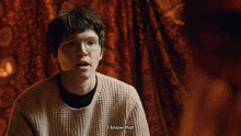 a man wearing glasses says " i know that "