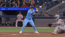 a baseball player in a blue jersey with the word boston on the back