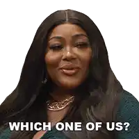 a woman with long hair and a necklace says which one of us
