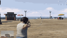 a video game screen shows a man aiming a gun at someone with the time of 10:22 am