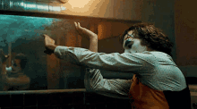 Joker Joaquin Phoenix GIF - Joker Joaquin Phoenix Stretch GIFs