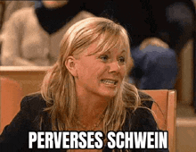 a woman is sitting in a chair and making a funny face with the words perverses schwein written above her .