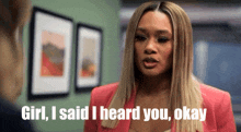 a woman in a pink jacket says girl i said i heard you ok