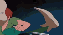 a close up of a cartoon character 's foot with a dark background