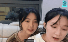 two girls are sitting next to each other and one of them says " sj so cute "