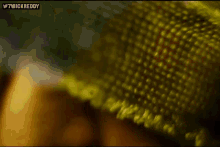 a close up of a person 's face with the words 7wickreddy on the top