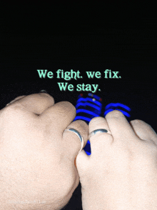 a man and woman holding hands with the words " we fight we fix we stay " behind them