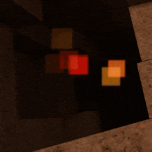 a blurred image of a brick wall with a red square in the center