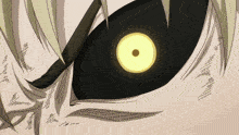 a close up of a cartoon character 's eye with a yellow center