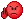 a pixel art of an angry red smiley face giving a middle finger .