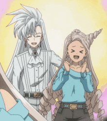 a man and a girl are standing next to each other and the girl is wearing a blue shirt that says x on it