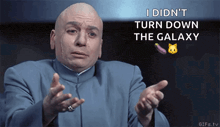 a bald man in a blue suit says i didn 't turn down the galaxy