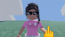 a girl wearing sunglasses giving the middle finger